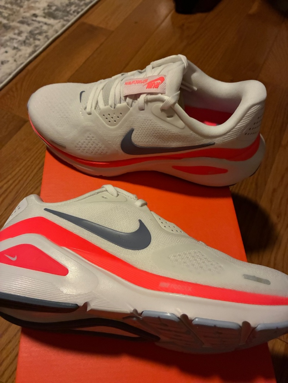 Nike Structure 26 Sneakers - brand new. White with orange details.